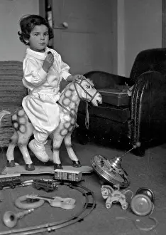 Hobbyhorse: Little boy playing with his toys