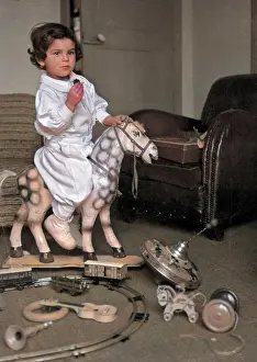 Hobbyhorse: Little boy playing with his toys