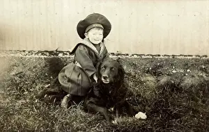 Patience: Little boy in sailor suit with dog