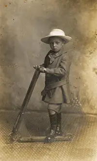 Jun17: Little boy with scooter, c.1900