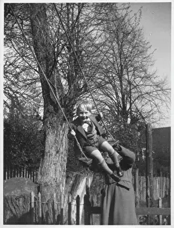 Feb21: Little boy on a swing
