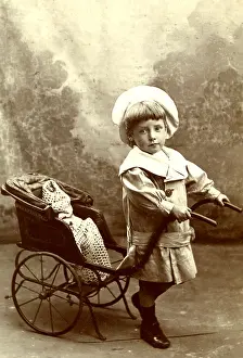 Props: Little boy with a toy rickshaw