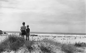 Perranporth: Little boys standing near the beach, Perranporth, Cornwall
