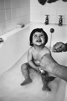 Taps: Little girl in the bath
