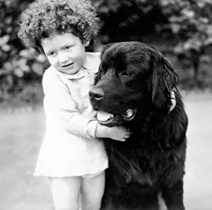Little girl and her large dog