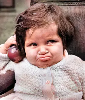 Grumpy: Little girl looking glum