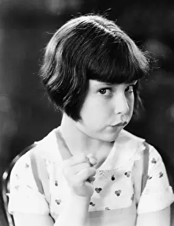 Coquette: Little girl looking mischievous