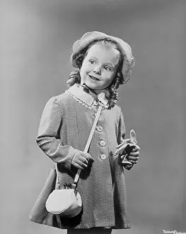 Glancing: Little Girl With Pocketbook