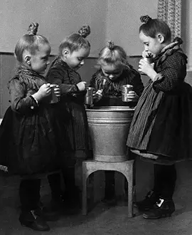 Mugs: Little girls brushing their teeth