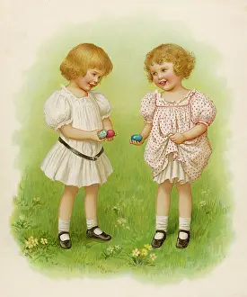 Comparing: Two little girls with Easter eggs