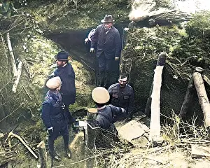 Escorted: Lloyd George emerging from German dugout, WW1