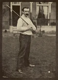 Relaxes: Lloyd George Golfing