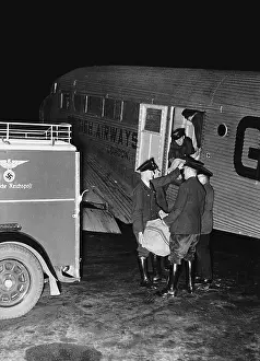 Existing: Loading air mail at the airport Berlin-Tempelhof, 1933