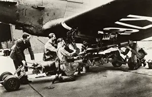 Arming: Loading Bombs onto an RAF Bomber prior to a patrol flight