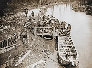 Explosives: Loading pontoon boats with ammunition, Western Front, WW1