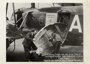 Outboard: Loading a small boat into a Cargo Plane