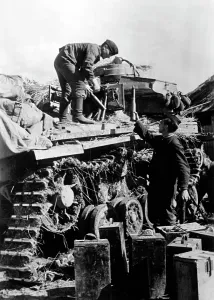Thus: Loading of a tank, 1942