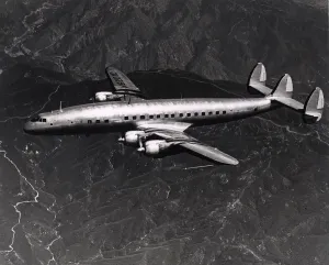 1049: Lockheed Model 1049 Super Constellation N6201C in flight