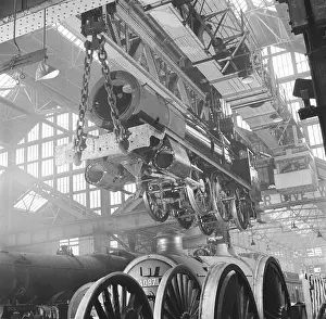 Thick: Locomotive construction in a large railway shed