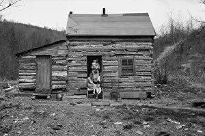 Resettled: Log Cabin home in Ohio. A mother with four ?