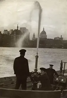 London Fire Brigade: London Fire Brigade firemen on a fireboat, River Thames