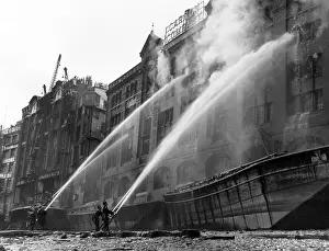Carron: London firefighters at work with hosepipes