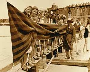 Contests: Long line of bathing beauties at the seaside