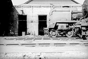 Elms: Looking across tracks at smoke box of steam engine