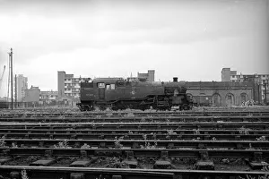 Elms: Looking across tracks at steam engine