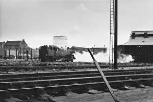 Elms: Looking across tracks at steam engine