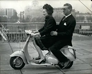 Cheapest: Lord and Lady Mancroft demonstrate Tina, automatic scooter