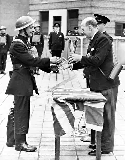 Waterproofs: Lord Mayor of London presenting a cup, WW2