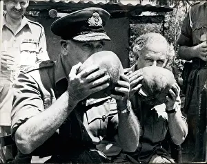 Coconuts: Lord Mountbatten drinks from coconut, Borneo