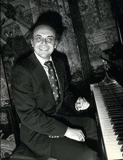 Symphonies: Lorin Maazel, American conductor, at the piano