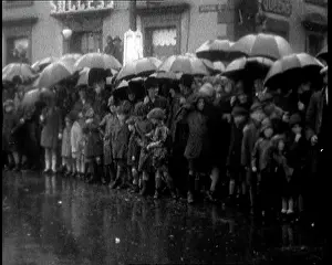 Lots: Lots Of People Standing Outside in the Rain