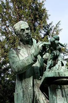 Xiiis: Low angle mid-length view of the statue called