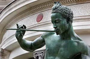 Bernardin: Low angle view of the statue called Le Charmeur