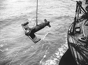 Lowering: Lowering a paravane on entering a minefield, WW1