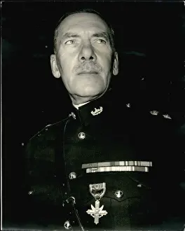 Invested: Lt Col James P Carne