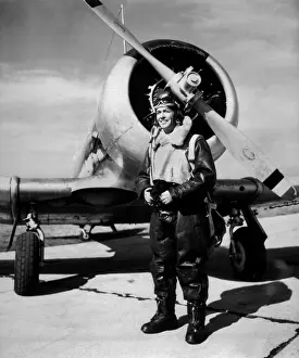 Instructional: Lt. Robert Taylor, USNR, standing beside a Navy