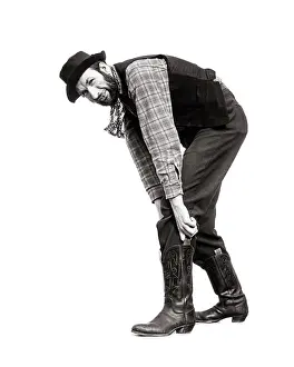Idiosyncratic: Down on his Luck Man Put on a Pair of Cowboy Boots