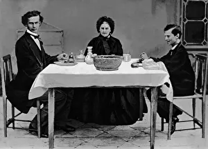 Ludwig II, King of Bavaria (1864-86), sits at a table
