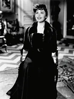 Escapade: Luise Rainer in Escapade wearing a Dolly Tree creation