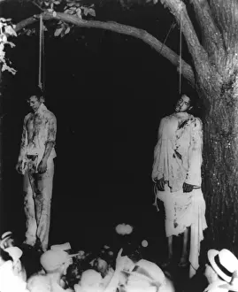 Tortures: Two lynched African American men, hanging ?