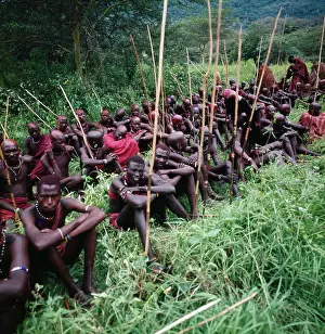 Pastoralists: Maasai warriors following proceedings at an initiation