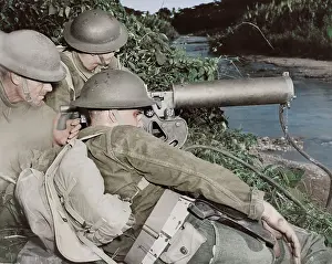 Surveillance: A machine gun crew of American troops in the