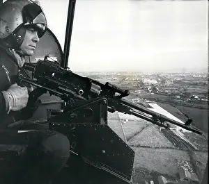 Phillip: Machine gun mounted in helicopter on patrol