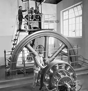 Machinists: Machinists check a diesel motor, 1900
