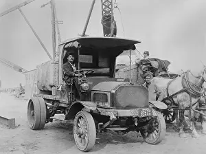 Lcgr1802: Mack Truck, workers, and horses at a construction