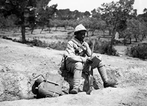 Wayside: Madagascan soldier reading